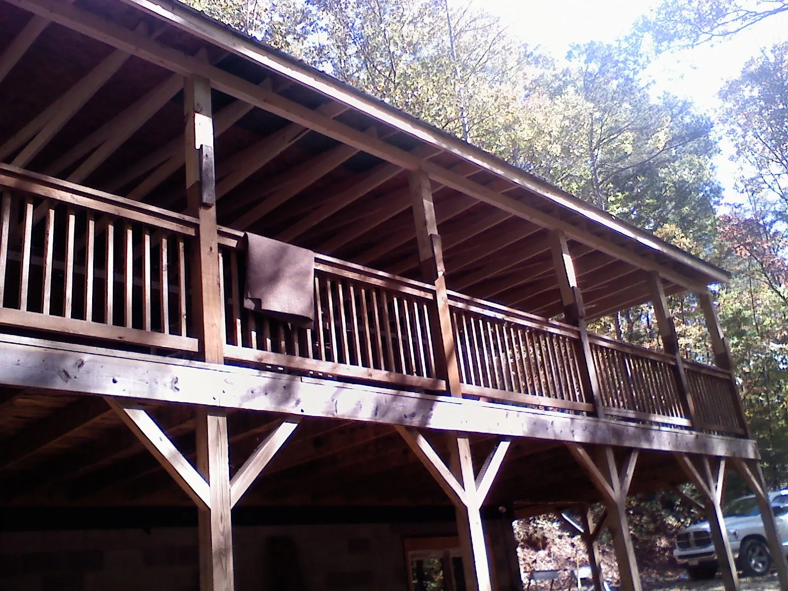 Timber framing under a new elevated porch and deck — Roof Leak Repair in West Jefferson by Roofing Brothers